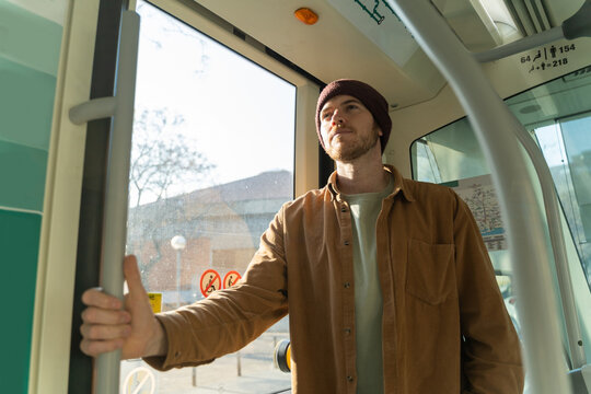 Man commuting by train to work