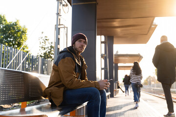Man waiting for train at station