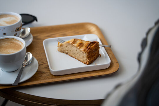Coffee cup and cake at cafeteria
