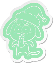 cute cartoon  sticker of a dog wearing santa hat