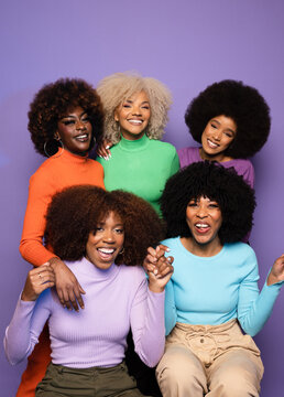 Portrait of young women with diverse afro hairstyles