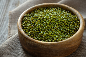 Mung bean seeds into bamboo bowl, Food ingredients in Asian cuisine