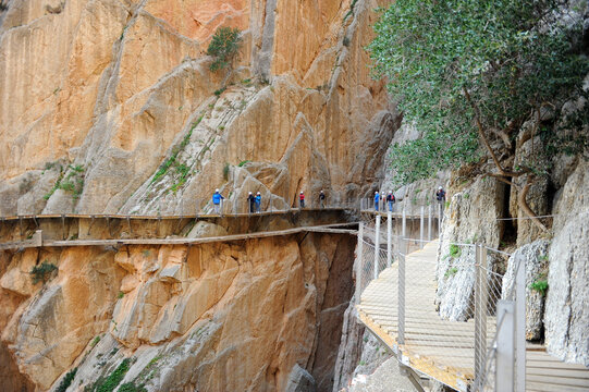 Hikers in the gorge of Los Gaitanes. Famous path of Caminito del Rey in Alora, province of Malaga, southern Spain, Europe