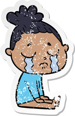 distressed sticker of a cartoon crying woman