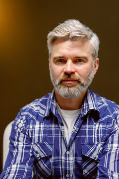 Portrait grey beard casual unemotional 
