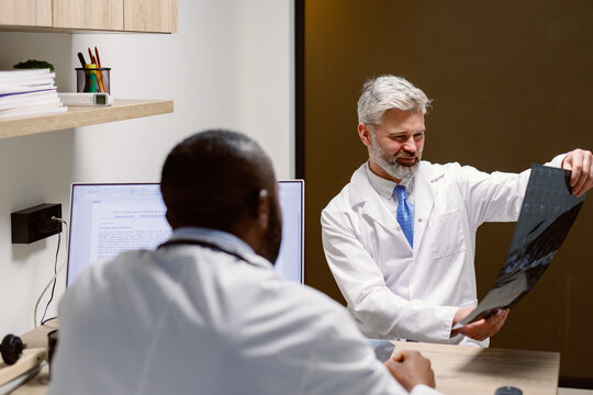 Doctor x-ray image diagnostic examination together