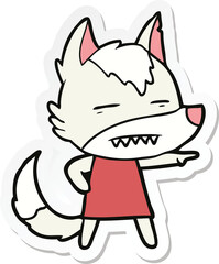 sticker of a cartoon wolf showing teeth