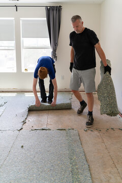 Two men working together