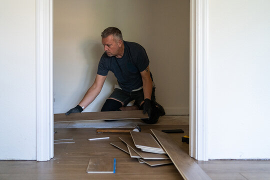 Man installing a new floor