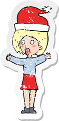 retro distressed sticker of a cartoon woman wearing xmas hat