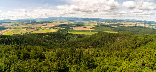 Panoramic view  of mountains seen from top of observation tower on Trojgarb mountain in Walbrzych