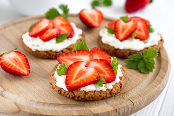 Healthy sandwich with strawberry and cream cheese. Tasty breakfast. Clean eating, keto diet or easy recipe of vegaterian sandwich for vegan menu.