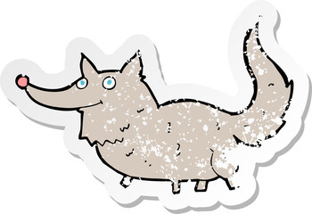 retro distressed sticker of a cartoon little wolf