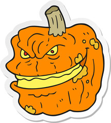 sticker of a cartoon spooky pumpkin