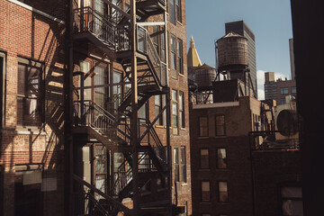 Water Tank on the Top of a Building in New York and a fire staircase