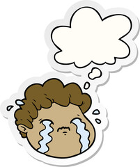 cartoon crying boy and thought bubble as a printed sticker