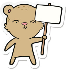 sticker of a happy cartoon bear with sign
