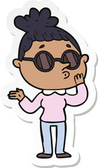 Obraz premium sticker of a cartoon woman wearing sunglasses