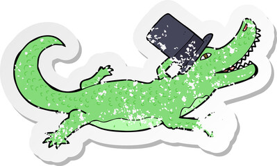 Obraz premium retro distressed sticker of a cartoon crocodile in top hat
