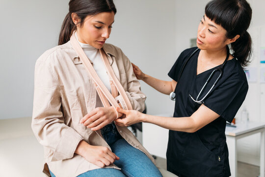 Female Doctor Examining Young Woman