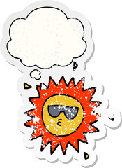cartoon sun and thought bubble as a distressed worn sticker