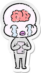 distressed sticker of a cartoon big brain alien crying