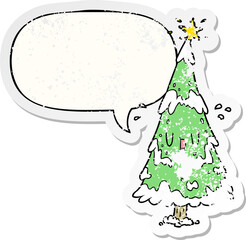 cartoon snowy christmas tree and happy face and speech bubble distressed sticker