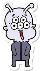 sticker of a happy cartoon alien