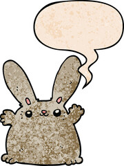 cartoon rabbit and speech bubble in retro texture style
