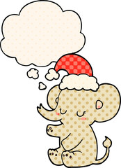 cute christmas elephant and thought bubble in comic book style