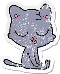 distressed sticker of a cartoon cat