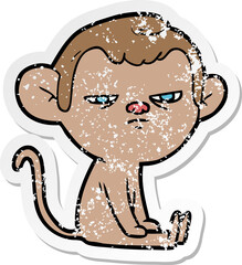 distressed sticker of a cartoon annoyed monkey