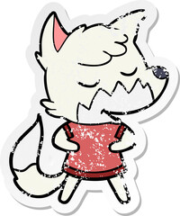 distressed sticker of a friendly cartoon fox