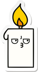 sticker of a cute cartoon lit candle