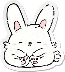 distressed sticker of a cartoon rabbit