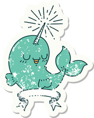 grunge sticker of tattoo style happy narwhal