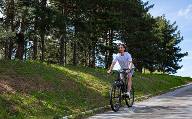 Naklejka premium Man riding bicycle