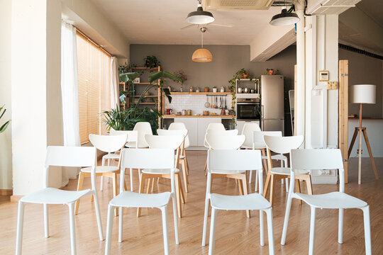 chairs prepared for conference in a coworking