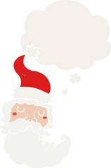 cartoon santa face and thought bubble in retro style