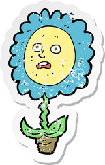 retro distressed sticker of a cartoon flower with face