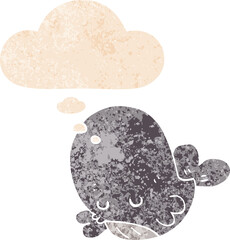cartoon whale and thought bubble in retro textured style