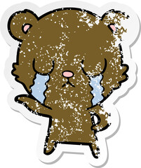 distressed sticker of a crying cartoon bear