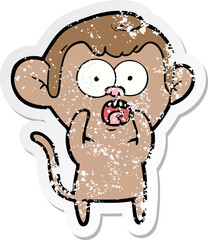 distressed sticker of a cartoon shocked monkey