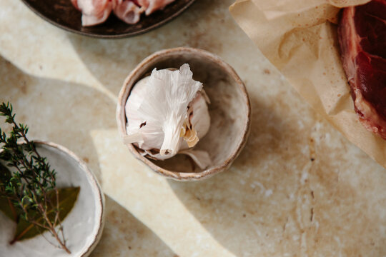 A bulb of garlic in a bowl