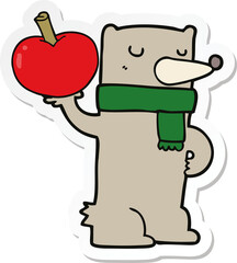 sticker of a cartoon bear with apple