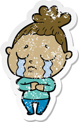 distressed sticker of a cartoon crying woman