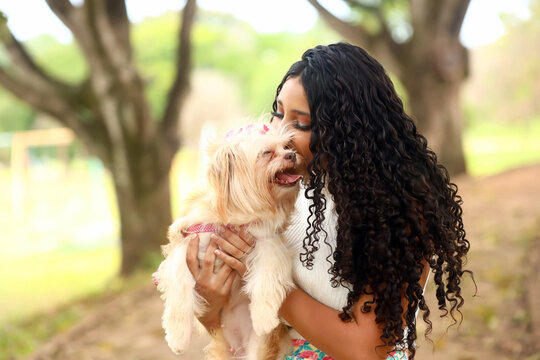 brazilian girl with her pet dog, bond, friendship, love, companionship, responsibility