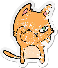 distressed sticker of a cartoon cat rubbing eye