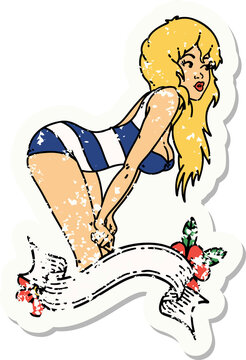 distressed sticker tattoo of a pinup girl in swimming costume with banner