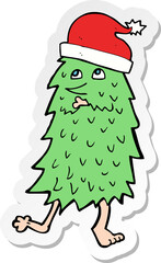 sticker of a cartoon christmas tree dancing